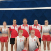 zdjęcie drużyny siatkarek z trenerami