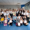 uczestnicy konkursu wraz z jury na scenie