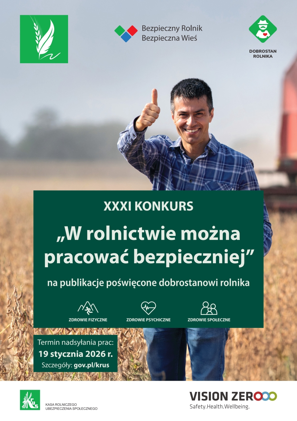 mężczyzna stojący w zbożu z kciukiem do góry
